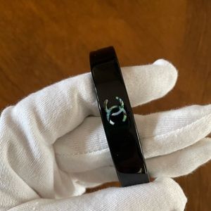 Chanel black resin bangle with abalone shell inlay